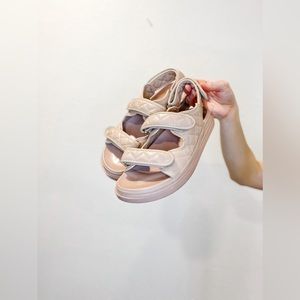Quilted beige Velcro sandals. Fits 8/8.5.